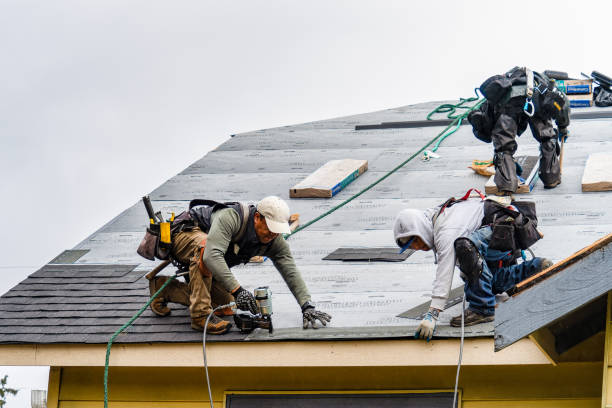 Professional Gutter Installation technician working in Plainville, CT